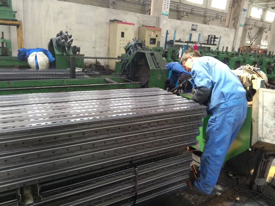 Precision welding and fabrication area for mezzanine racking structures